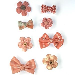 Pink and peach cloth and wood Floral and Bow Hair Accessories Set of 8.